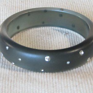 Acrylic black or dark gray bracelet with rhinestones